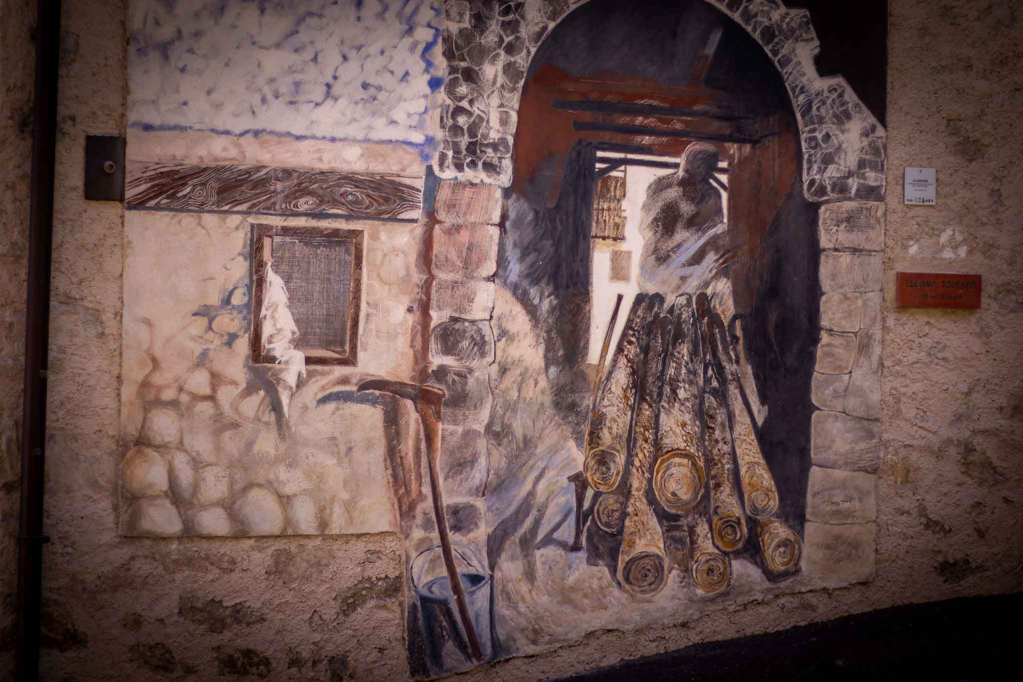 tronchi a valle la vedovea murale cibiana di cadore