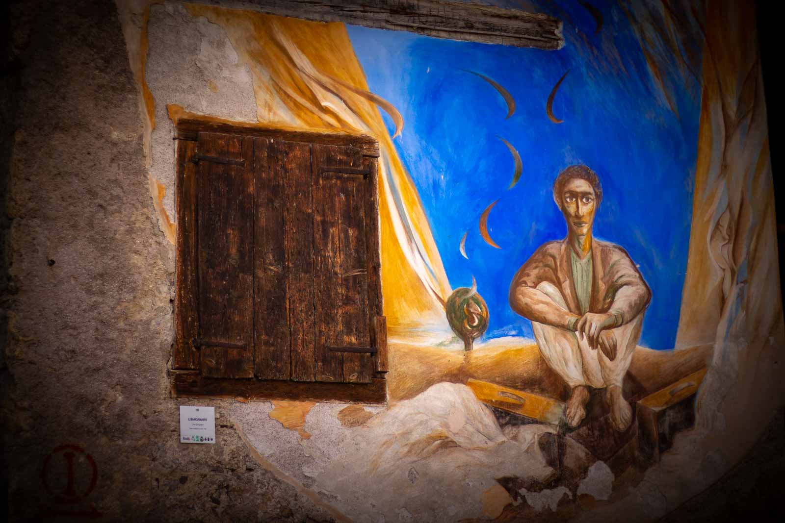 L'emigrante, Murale cibiana di cadore dolomiti